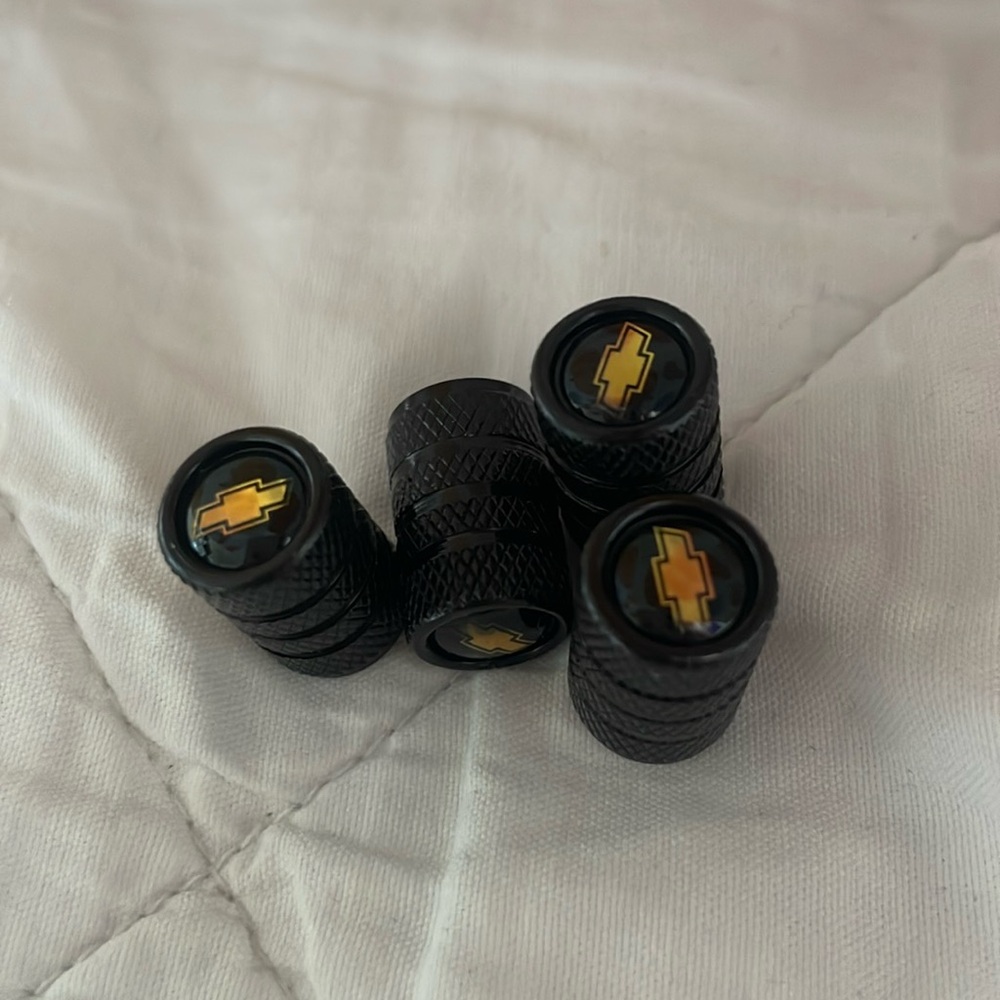 Four new‎ Chevrolet Theme Valve Stem Covers